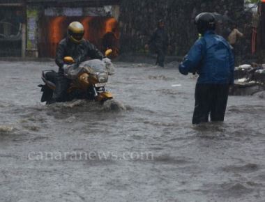 Downpour claims one life, hits commuters