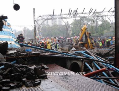 Mumbai crippled after bridge crash, heavy rains