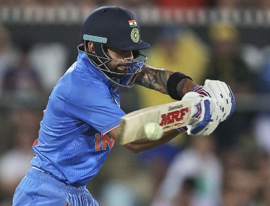 India survive Amir scare to win by 5 wickets