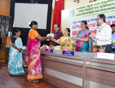 MRPL distributes LED bulbs to neighbouring villages