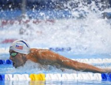 Phelps into fifth Olympics in event that launched Games career