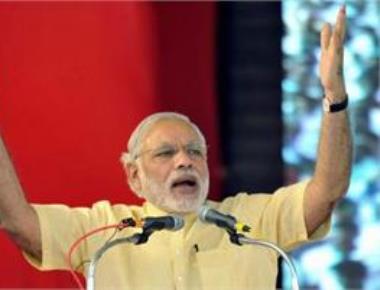 Guj poll is contest between trust on development and dynastic politics: Modi