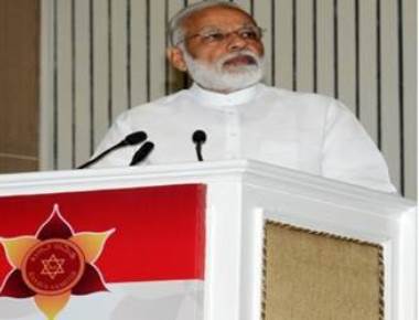 Modi takes dig at Rahul for visit to Somnath temple