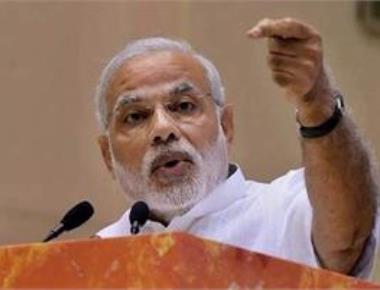 Country suffering due to 'wrong' policies of Cong: PM in LS