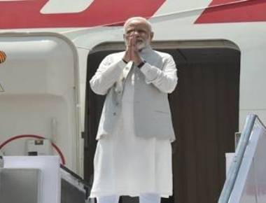 Modi reaches China to attend BRICS Summit