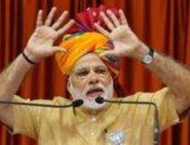 Govt takes on Manmohan after he tears into Modi in rare row