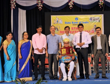 SBI felicitates state film award winning actor Naveen D Padil