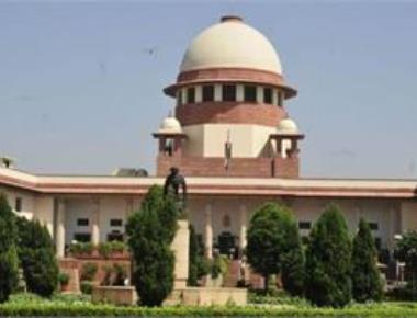 SC declares Aadhaar scheme constitutionally valid, strikes down some provisions